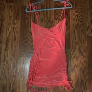 Orange cowl front mini dress.